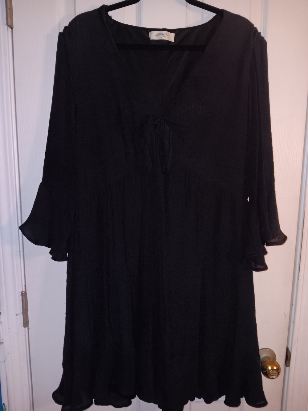 Flowy Black V-Neck Long Sleeve Dress with Ruffle Cuffs